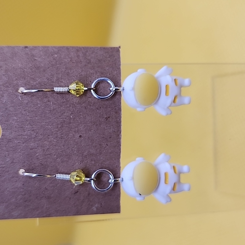 White suit astronaut earrings